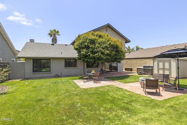 3051 Ketch Pl, Oxnard, CA 93035 - rear view of property with a patio area, a storage shed, stucco siding, and roof with shingles