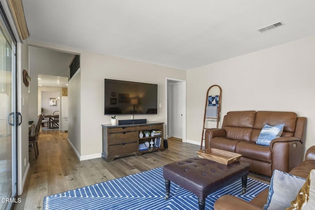3051 Ketch Pl, Oxnard, CA 93035 - living room featuring wood finished floors and baseboards