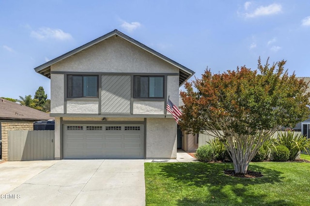 3051 Ketch Pl, Oxnard, CA 93035 - view of front of home with stucco siding, an attached garage, and concrete driveway