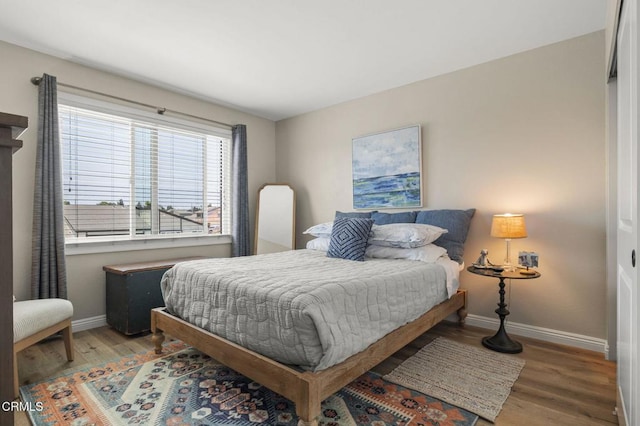 3051 Ketch Pl, Oxnard, CA 93035 - bedroom with baseboards and wood finished floors