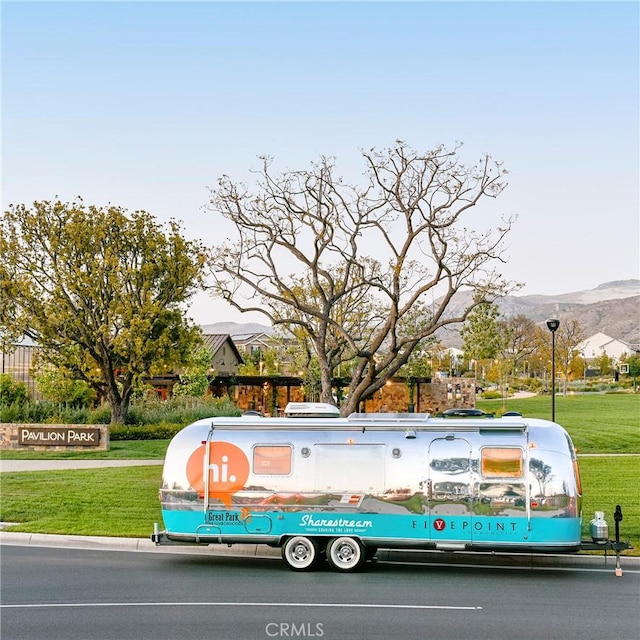 143 Interval, Irvine, CA 92618 - view of community featuring a yard and a mountain view