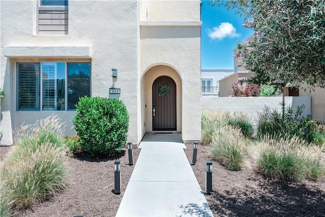 143 Interval, Irvine, CA 92618 - view of exterior entry featuring stucco siding