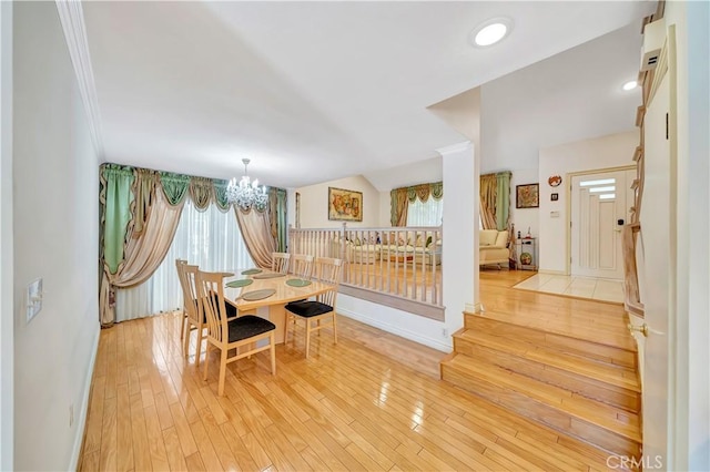 11830 Killimore Ave, Porter Ranch, CA 91326 - dining area featuring a chandelier and wood finished floors