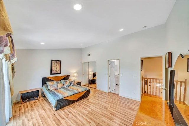 11830 Killimore Ave, Porter Ranch, CA 91326 - bedroom featuring light wood-style flooring, recessed lighting, and high vaulted ceiling