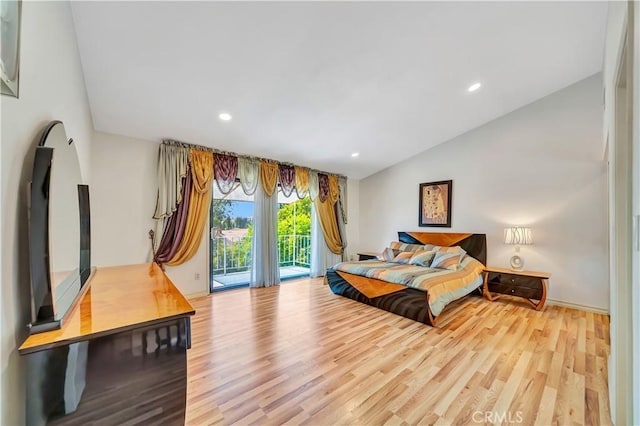 11830 Killimore Ave, Porter Ranch, CA 91326 - bedroom with vaulted ceiling, access to exterior, wood finished floors, and recessed lighting