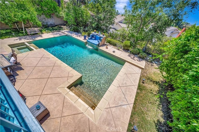 11830 Killimore Ave, Porter Ranch, CA 91326 - view of pool featuring a pool with connected hot tub, a fenced backyard, and a patio area
