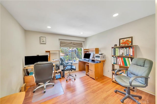 11830 Killimore Ave, Porter Ranch, CA 91326 - office area with light wood-style floors and recessed lighting