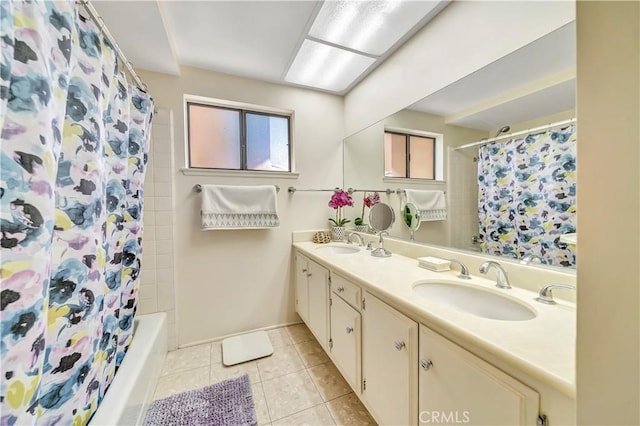 11830 Killimore Ave, Porter Ranch, CA 91326 - bathroom with double vanity, tile patterned flooring, and shower / tub combo