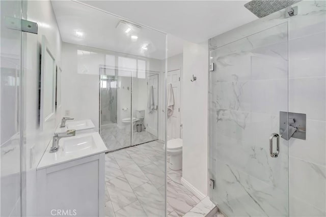 11830 Killimore Ave, Porter Ranch, CA 91326 - bathroom with a marble finish shower, double vanity, and marble finish flooring