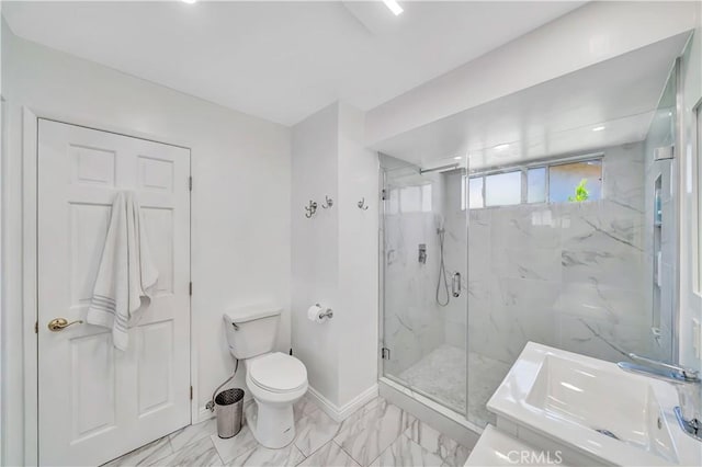 11830 Killimore Ave, Porter Ranch, CA 91326 - bathroom with a marble finish shower, marble look tile flooring, and vanity