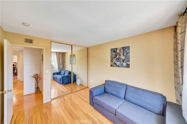 11830 Killimore Ave, Porter Ranch, CA 91326 - living area featuring light wood finished floors and baseboards