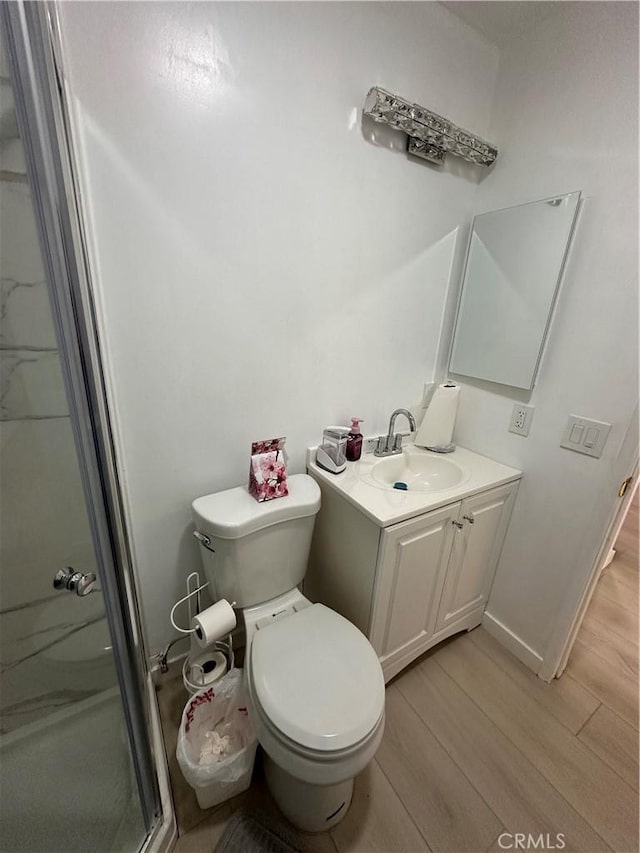 6350 Genesee Ave Unit 107, San Diego, CA 92122 - full bath with vanity, a stall shower, and wood finished floors