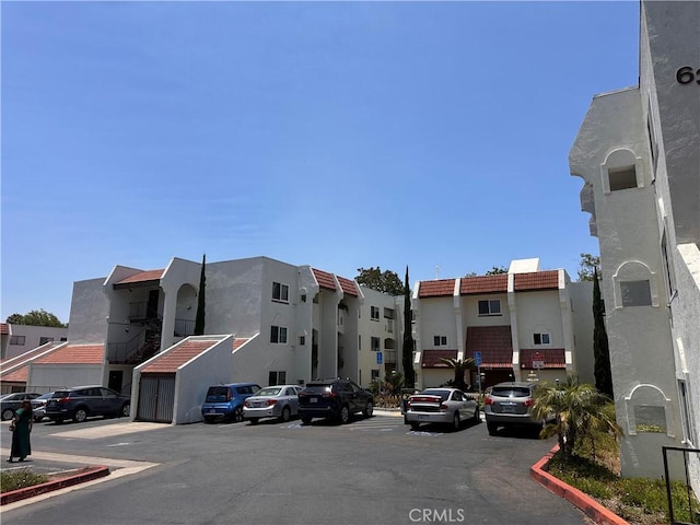 6350 Genesee Ave Unit 107, San Diego, CA 92122 - view of asphalt road featuring curbs
