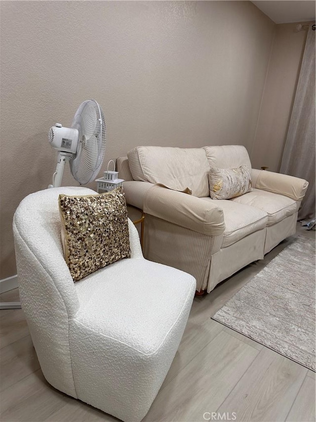 6350 Genesee Ave Unit 107, San Diego, CA 92122 - sitting room featuring wood finished floors
