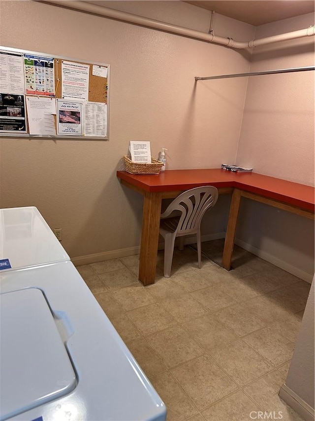 6350 Genesee Ave Unit 107, San Diego, CA 92122 - laundry room with baseboards