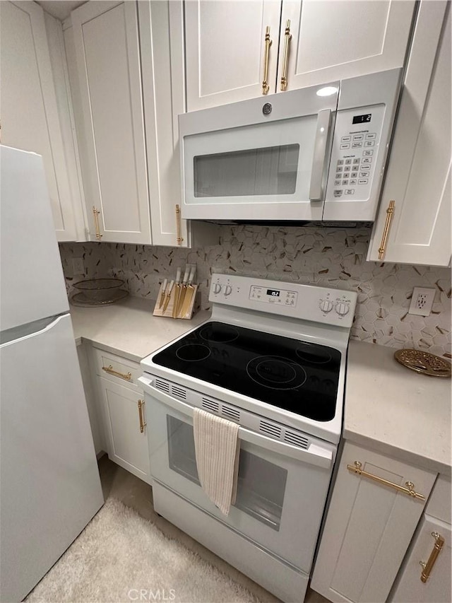 6350 Genesee Ave Unit 107, San Diego, CA 92122 - kitchen with white appliances, light countertops, and white cabinetry