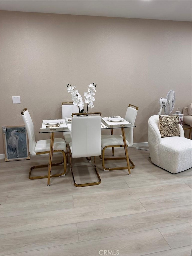 6350 Genesee Ave Unit 107, San Diego, CA 92122 - dining room with wood finished floors