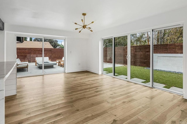 3167 Camarillo Ave, Oceanside, CA 92056 - unfurnished sunroom with a chandelier