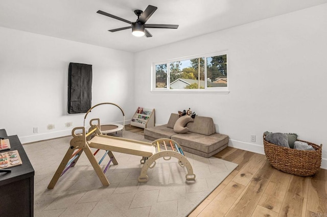 3167 Camarillo Ave, Oceanside, CA 92056 - living area with ceiling fan and wood finished floors