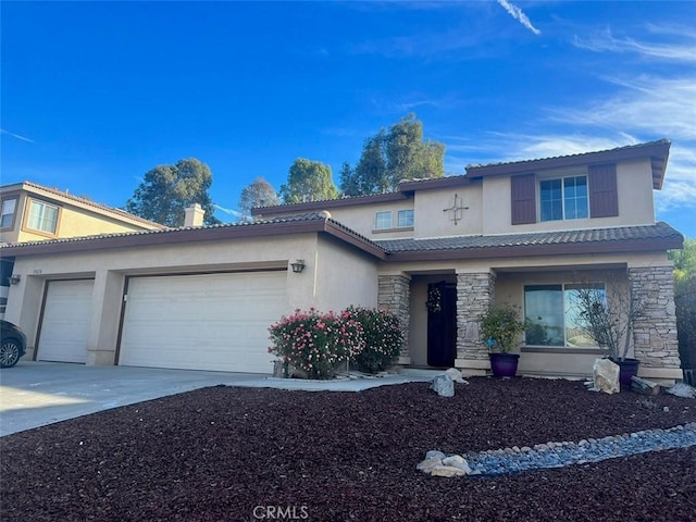 35658 Denali Way, Winchester, CA 92596 - traditional-style home featuring an attached garage, driveway, stucco siding, and a tile roof