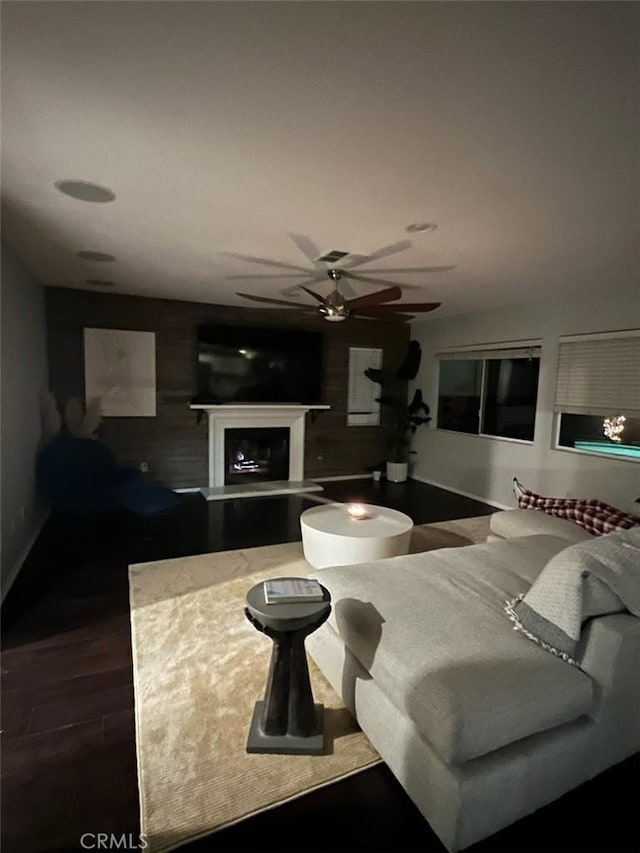 35658 Denali Way, Winchester, CA 92596 - living room with a ceiling fan, a fireplace with raised hearth, and wood finished floors