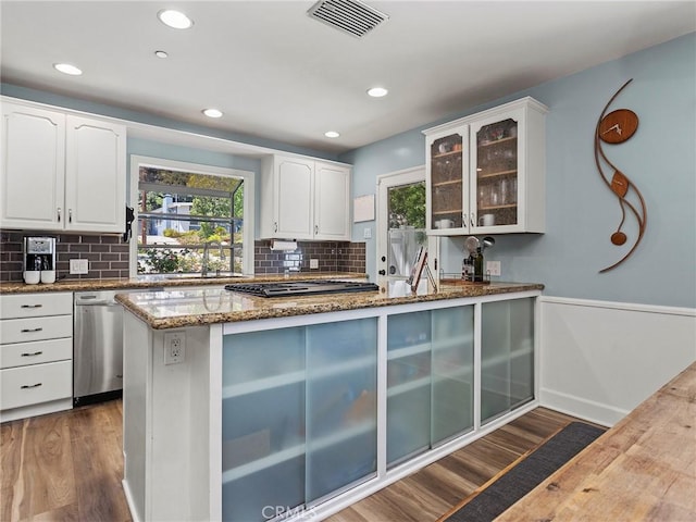 3828 2nd Ave, La Crescenta, CA 91214 - kitchen with appliances with stainless steel finishes, dark wood-style floors, stone counters, glass insert cabinets, and healthy amount of natural light