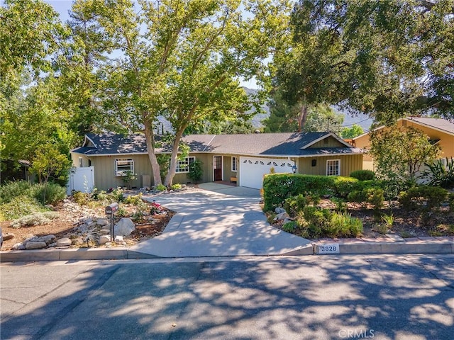 3828 2nd Ave, La Crescenta, CA 91214 - ranch-style home with concrete driveway and a garage