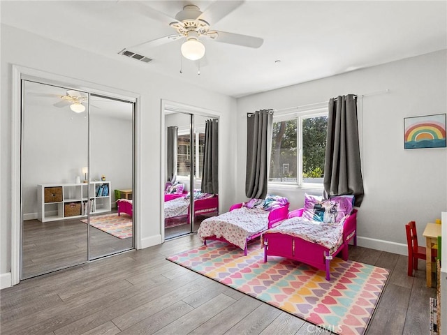 3828 2nd Ave, La Crescenta, CA 91214 - bedroom with multiple closets, wood finished floors, and a ceiling fan