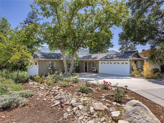 3828 2nd Ave, La Crescenta, CA 91214 - view of front of home featuring concrete driveway and an attached garage