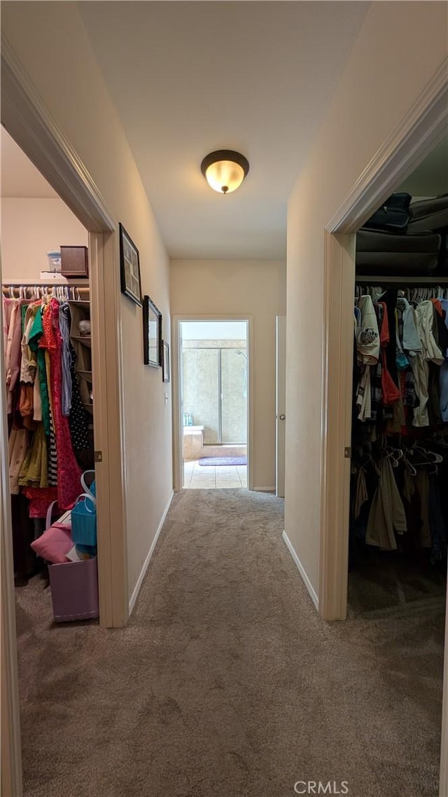3242 Ashbury Ave, Madera, CA 93637 - corridor featuring carpet floors and baseboards