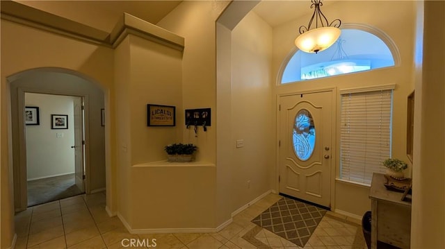 3242 Ashbury Ave, Madera, CA 93637 - entrance foyer featuring arched walkways and light tile patterned floors