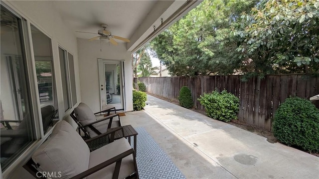 3242 Ashbury Ave, Madera, CA 93637 - fenced backyard featuring ceiling fan and a patio area