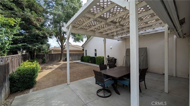 3242 Ashbury Ave, Madera, CA 93637 - fenced backyard featuring a pergola, a patio, and outdoor dining space