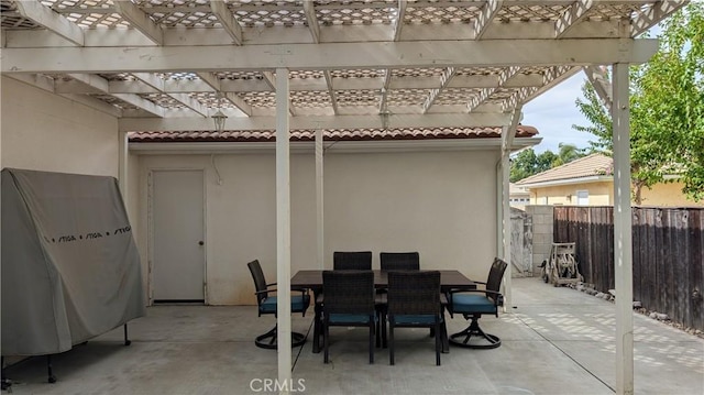 3242 Ashbury Ave, Madera, CA 93637 - view of patio featuring a pergola and outdoor dining space