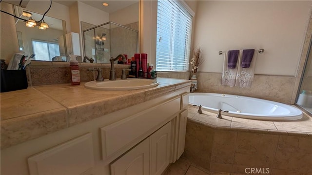 3242 Ashbury Ave, Madera, CA 93637 - bathroom featuring vanity, a shower stall, a bath, and tile patterned floors