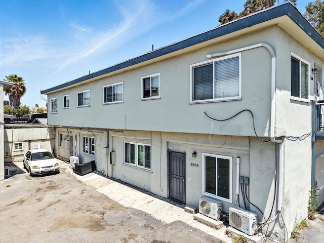 550206 E University Ave, San Diego, CA 92105 - back of house featuring stucco siding