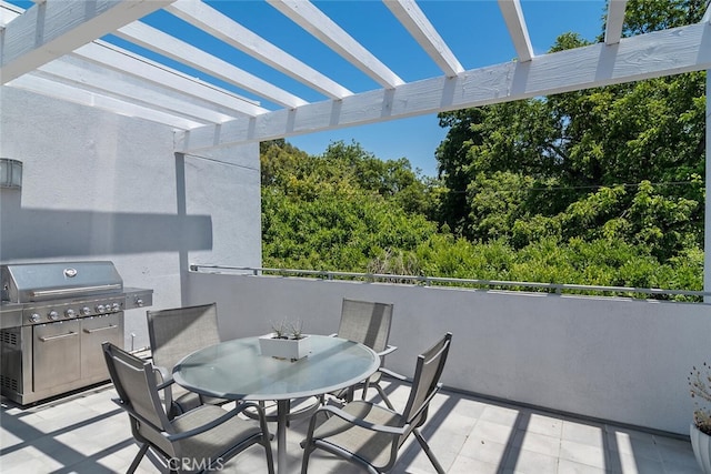 4240 Laurel Canyon Blvd Unit 307, Studio City, CA 91604 - view of patio with outdoor dining area, a pergola, and an outdoor kitchen