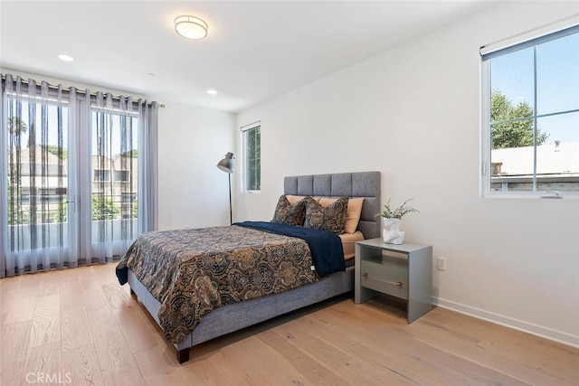 4240 Laurel Canyon Blvd Unit 307, Studio City, CA 91604 - bedroom featuring light wood finished floors, multiple windows, and recessed lighting