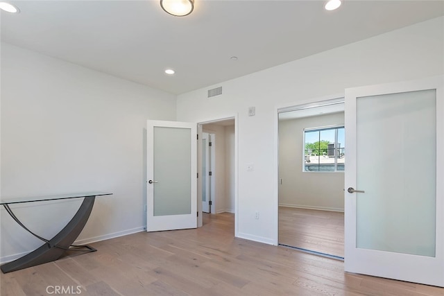 4240 Laurel Canyon Blvd Unit 307, Studio City, CA 91604 - unfurnished bedroom with wood finished floors and recessed lighting