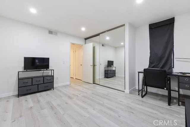 5885 El Cajon Blvd Unit 105, San Diego, CA 92115 - living area featuring an office area, wood finished floors, and recessed lighting