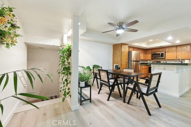 5885 El Cajon Blvd Unit 105, San Diego, CA 92115 - dining area with a raised ceiling, light wood-style flooring, recessed lighting, and a ceiling fan