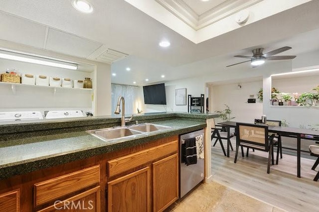 5885 El Cajon Blvd Unit 105, San Diego, CA 92115 - kitchen with stainless steel dishwasher, brown cabinetry, dark countertops, recessed lighting, and a ceiling fan