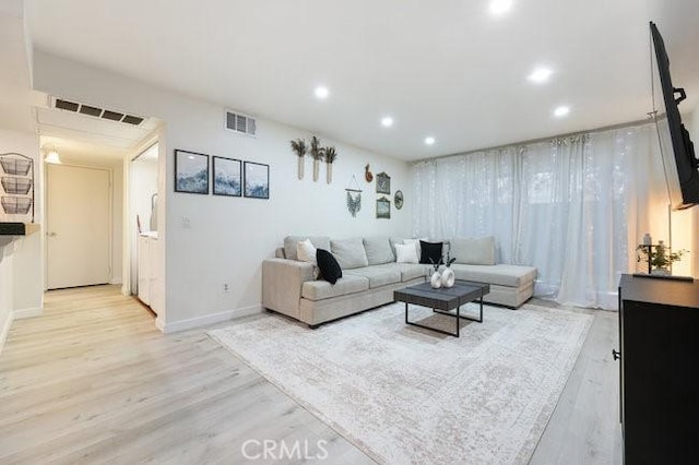 5885 El Cajon Blvd Unit 105, San Diego, CA 92115 - living area featuring light wood-style flooring and recessed lighting