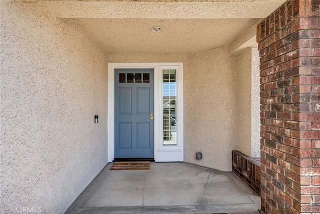 13982 Claremont Ln, Rancho Cucamonga, CA 91739 - view of exterior entry with stucco siding