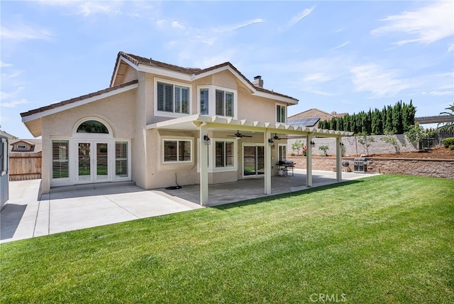 13982 Claremont Ln, Rancho Cucamonga, CA 91739 - back of property featuring ceiling fan, stucco siding, a chimney, a patio, and a pergola