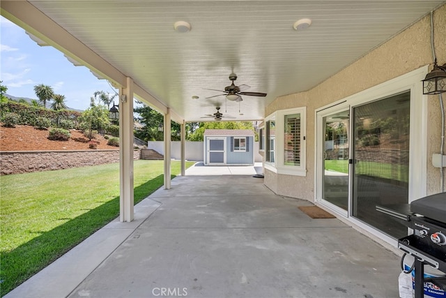 13982 Claremont Ln, Rancho Cucamonga, CA 91739 - view of patio / terrace featuring a storage unit and a ceiling fan