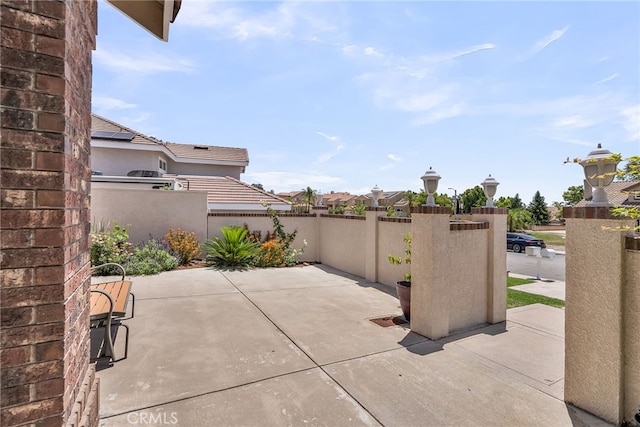 13982 Claremont Ln, Rancho Cucamonga, CA 91739 - view of patio with a residential view