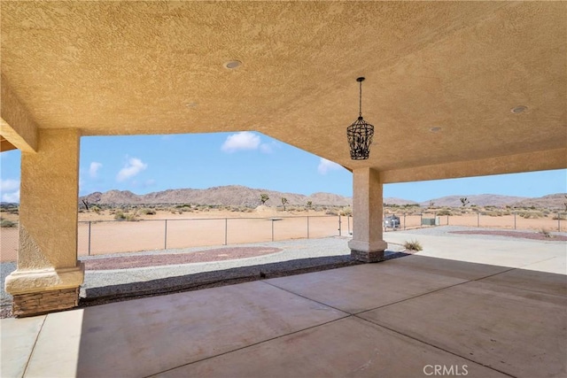 15090 Olema Rd, Apple Valley, CA 92307 - fenced backyard featuring a mountain view and a patio area