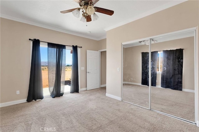 15090 Olema Rd, Apple Valley, CA 92307 - unfurnished bedroom featuring ornamental molding, carpet flooring, a closet, and a ceiling fan