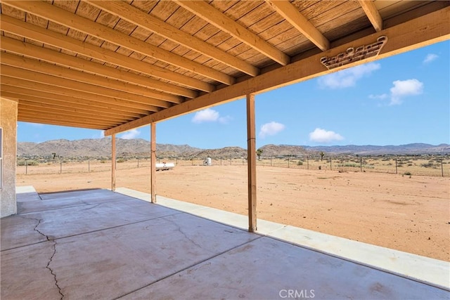 15090 Olema Rd, Apple Valley, CA 92307 - view of patio / terrace with a mountain view and a view of countryside